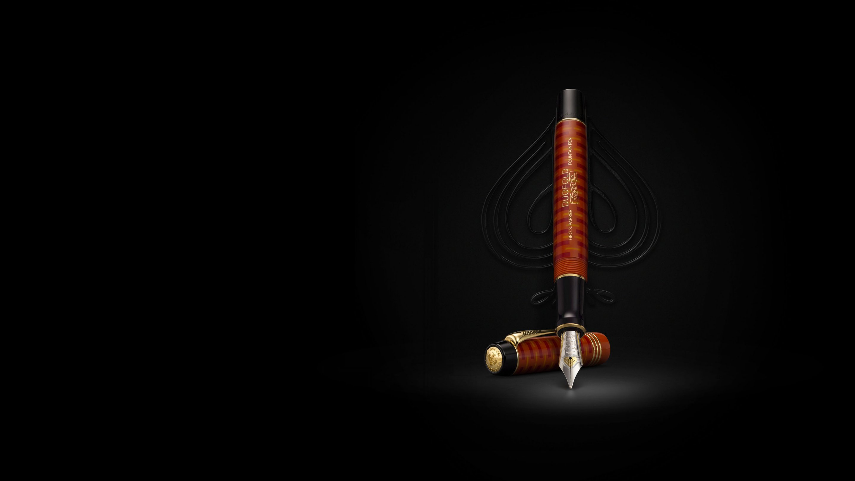 A Duofold Limited Edition fountain pen in red G T finish under a spotlight.