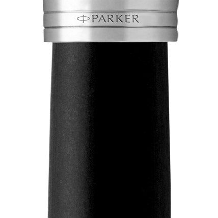 Closeup of a Parker 51 pen barrel and pen cap with chrome trim showcasing an engraved Parker logo.