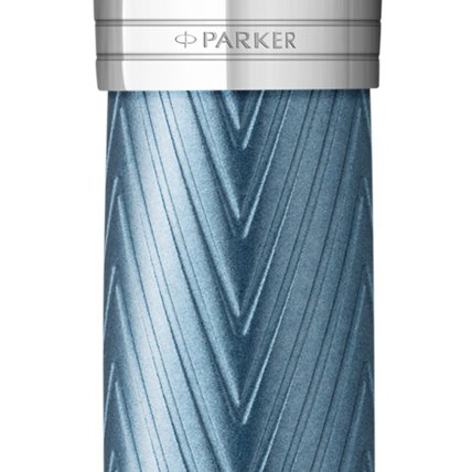 Closeup of a Parker 51 pen barrel and pen cap with chrome trim showcasing an engraved Parker logo.