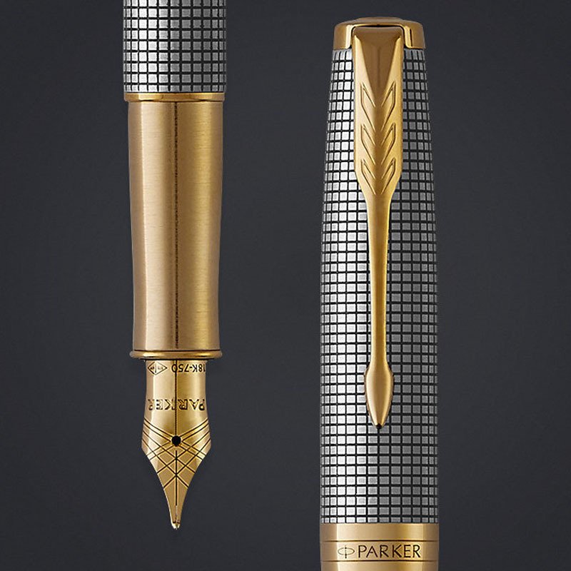 Closeup of a Sonnet Dolma kalem nib and pen cap with gold trim.