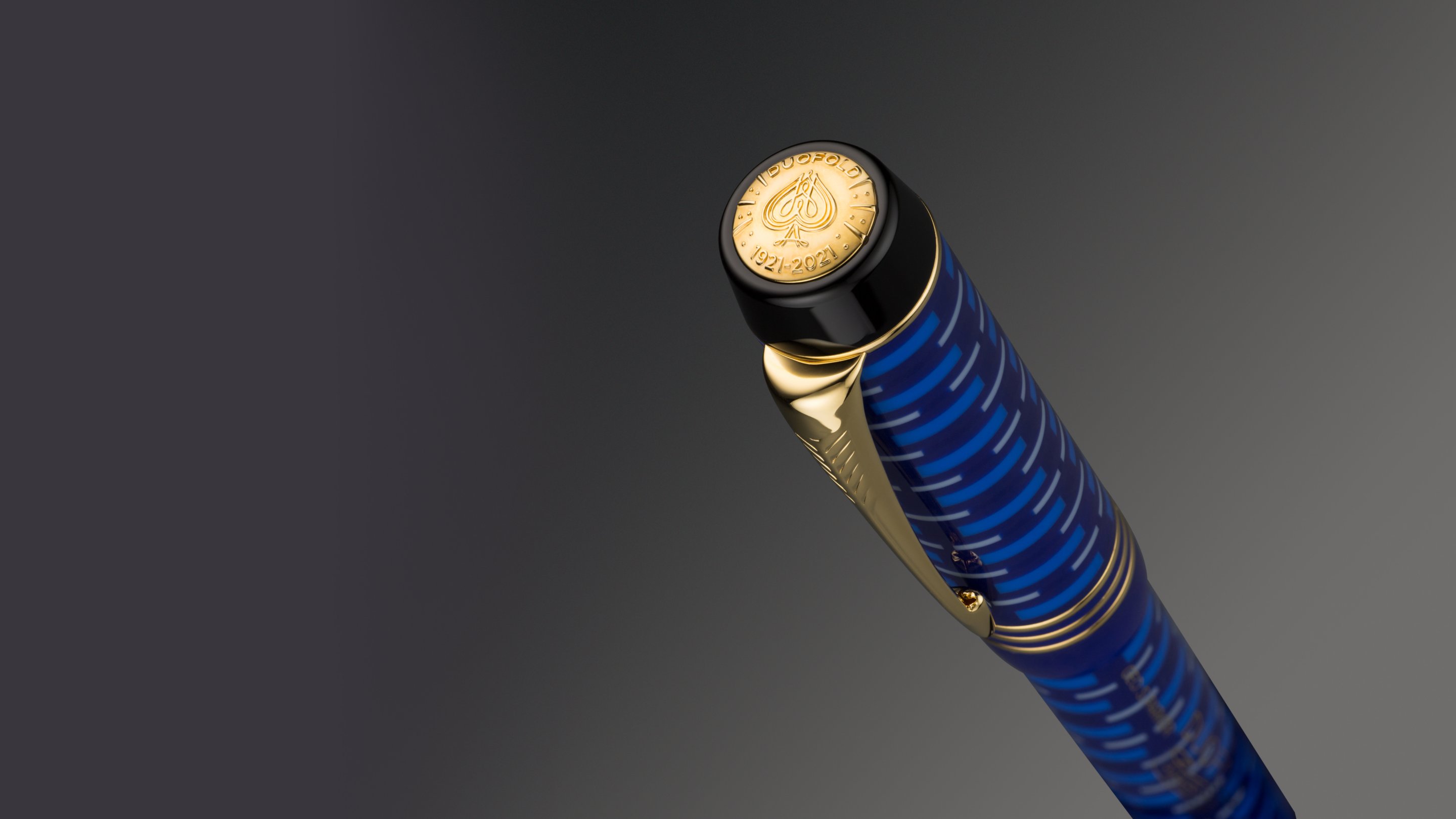 Closeup of an engraved fountain pen nib.