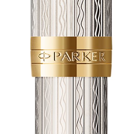 Closeup of a Sonnet barrel and pen cap with gold trim showcasing an engraved Parker logo.
