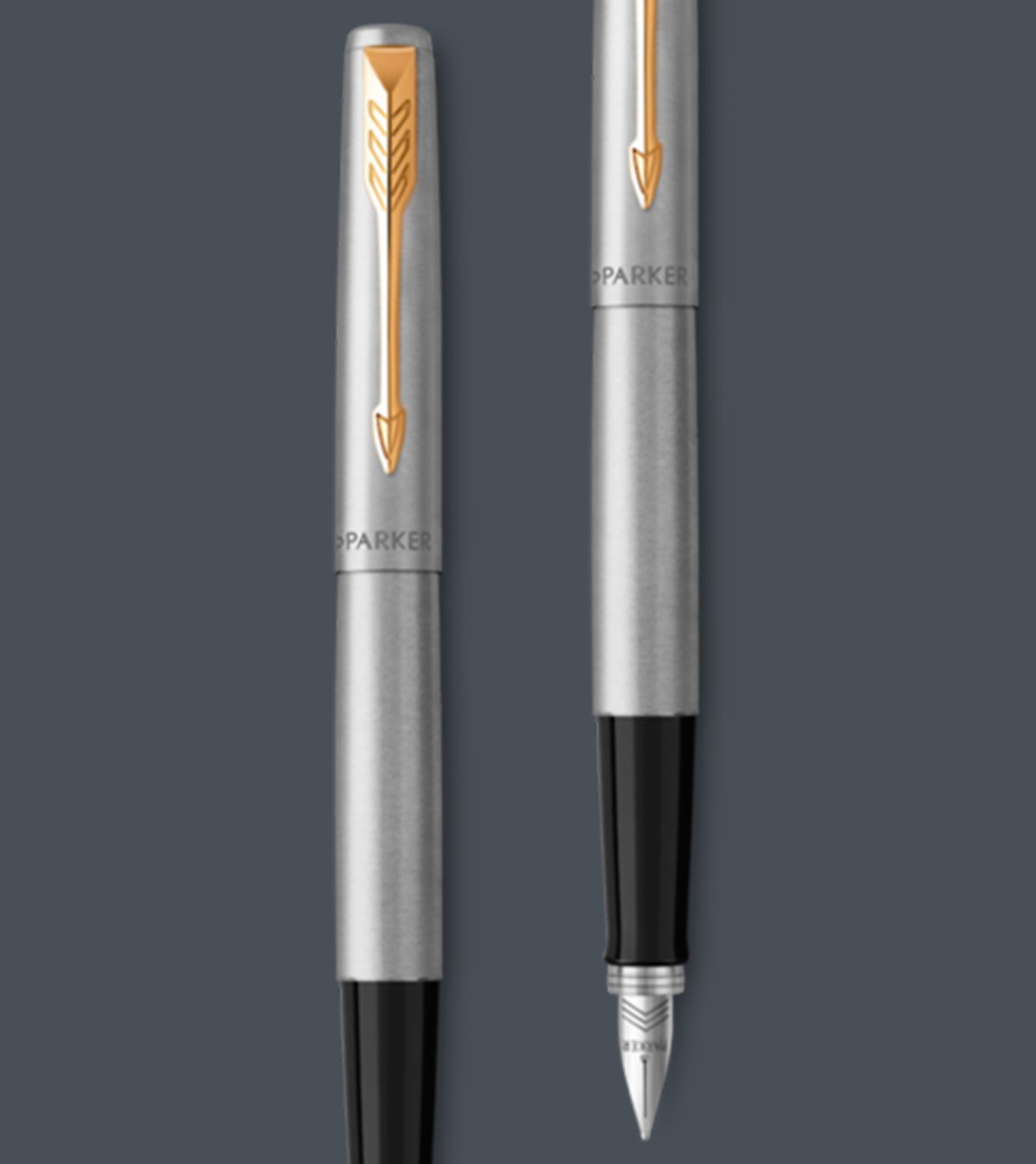 Two upright Jotter Dolma kalems with chrome trim.
