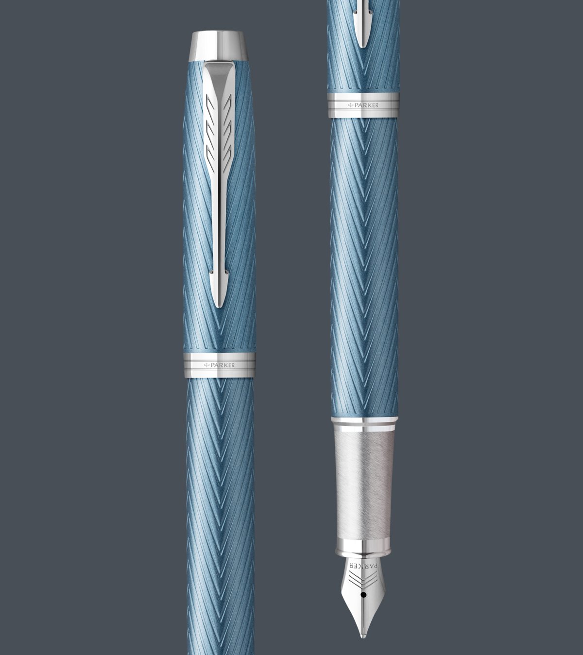 Two upright Parker IM Dolma kalems with chrome trim.